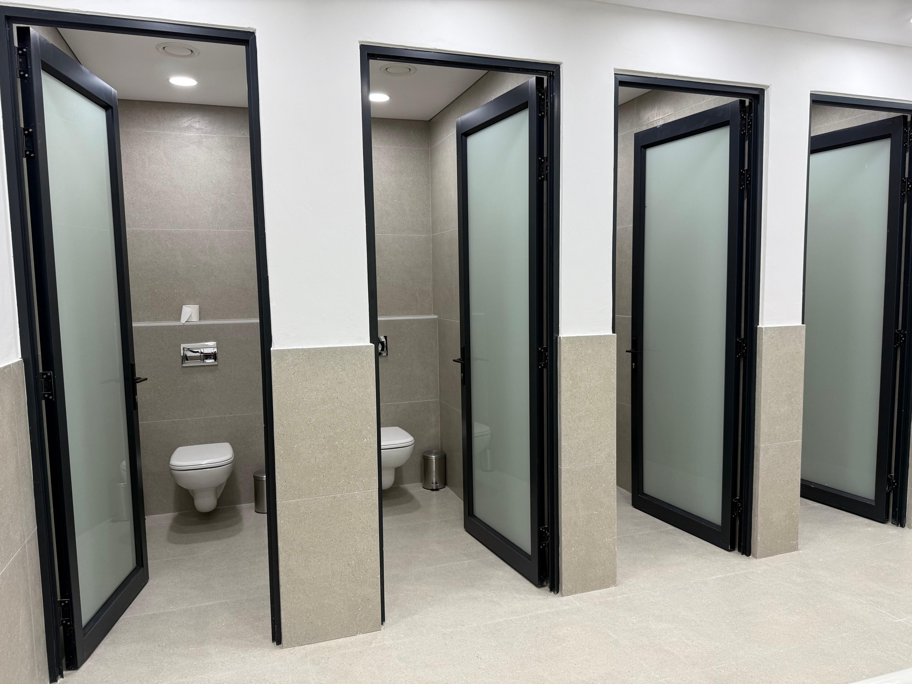 Fresh air ventilation system installed by Swift Air in a commercial bathroom setting – improved airflow and indoor air quality in public restrooms.